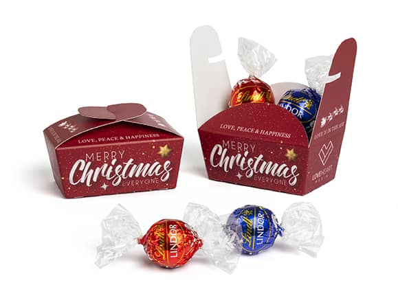Lindt Lindor Xmas Ballotin Mit einem Give Away als Werbegeschenk wie Lindt Lindor Xmas Ballotin schenkt man Freude.